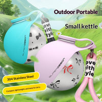 Dog owner holding the Splash & Go Portable Water Bottle on a walk
